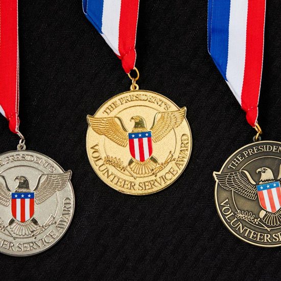 PVSA gold, silver, and bronze medals on red, white, and blue ribbons
